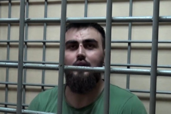 Задержанный владелец пистолета Макарова. Кадр оперативной съемки